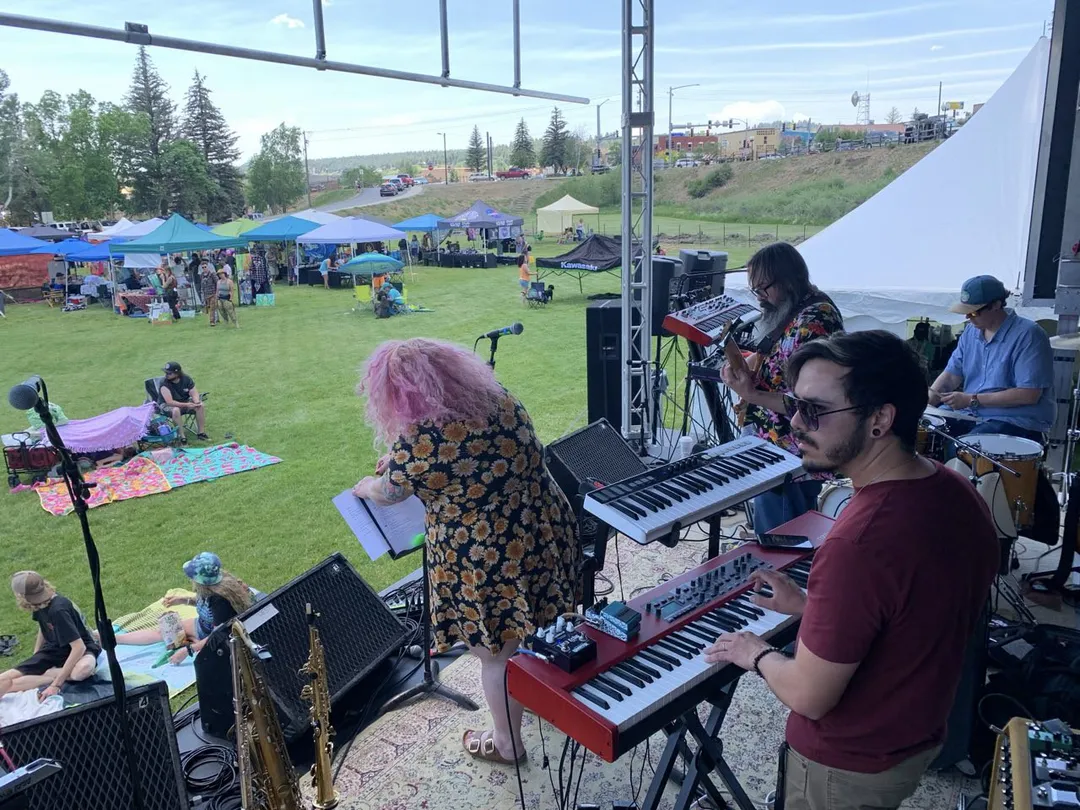 Hip Hop is Dead playing a live show outdoors in Colorado.